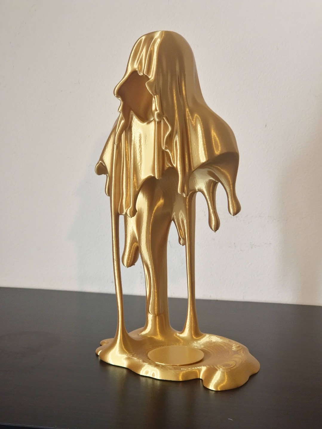 Melting Golden Man (LED) Candle Holder